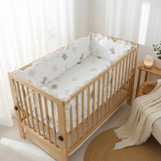 Entourage de lit bébé installation rapide grâce a ses attaches