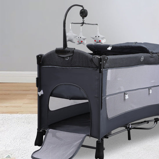 Lit parapluie matelas ornement dispose des rangements de jouets
