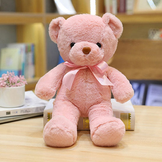 Ours peluche adorable stimule l'imagination de bébé