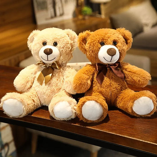 Peluche ours ruban nœud papillon apporte un style élégant au doudou
