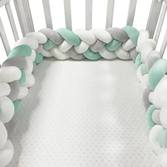 Natte de lit teinte douce contribue à apaiser bébé pendant son sommeil