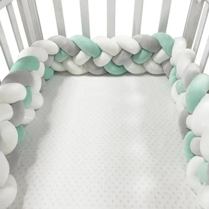 Natte de lit teinte douce contribue à apaiser bébé pendant son sommeil