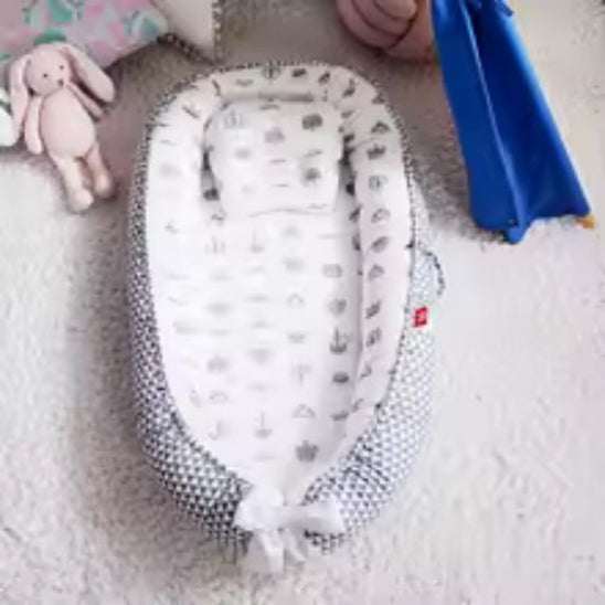 Réducteur de lit bébé respirant pour confort optimal de bébé