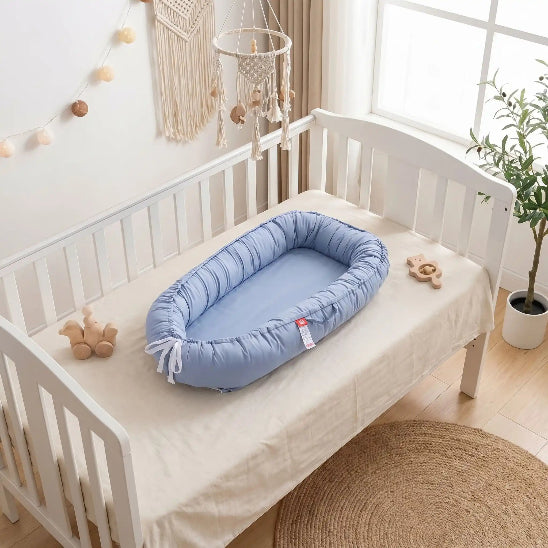 Reducteur de lit cododo ajustable  pour croissance bébé