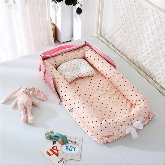 Reducteur de lit cododo rose dragée