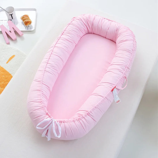 Reducteur de lit cododo rose joli