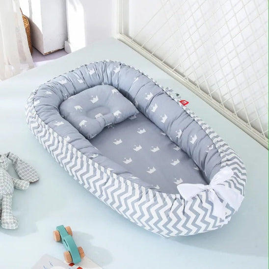 Reducteur lit bebe cocon rassurant pour sommeil paisible de bébé