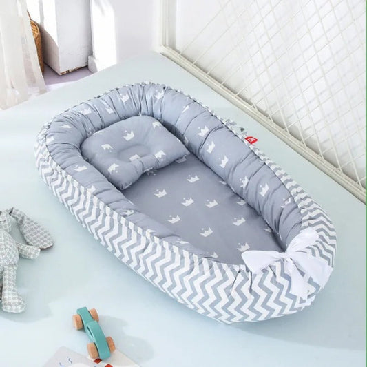 Reducteur lit bebe cocon rassurant pour sommeil paisible de bébé