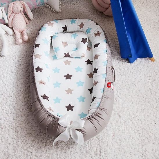 Reducteur lit bebe ergonomique adaptable à morphologie bébé