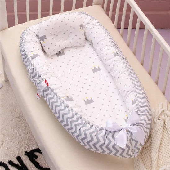Reducteur lit bebe rembourrage amorti mouvement contre-bord du lit
