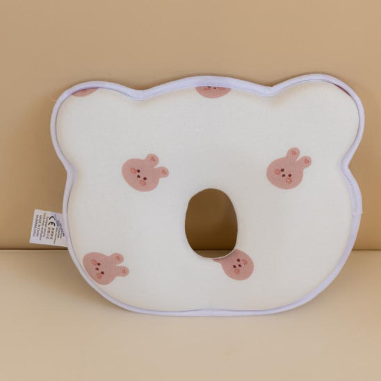 oreiller lapin tient tete bebe