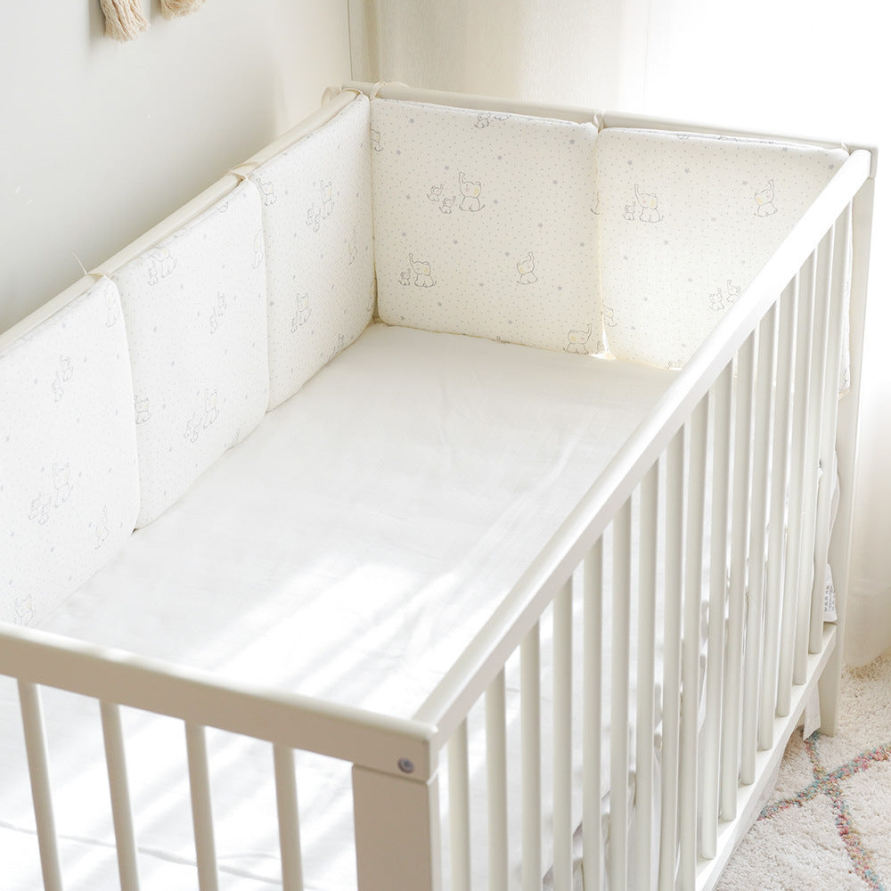 tour de lit bebe blanc enveloppe parfaitement lit  de bebe
